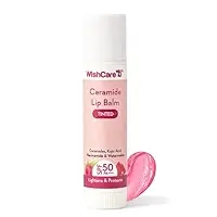 applying wishcare SPF 50 lip balm on lips